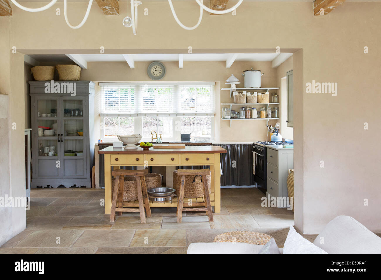 Island in kitchen of rustic house Stock Photo