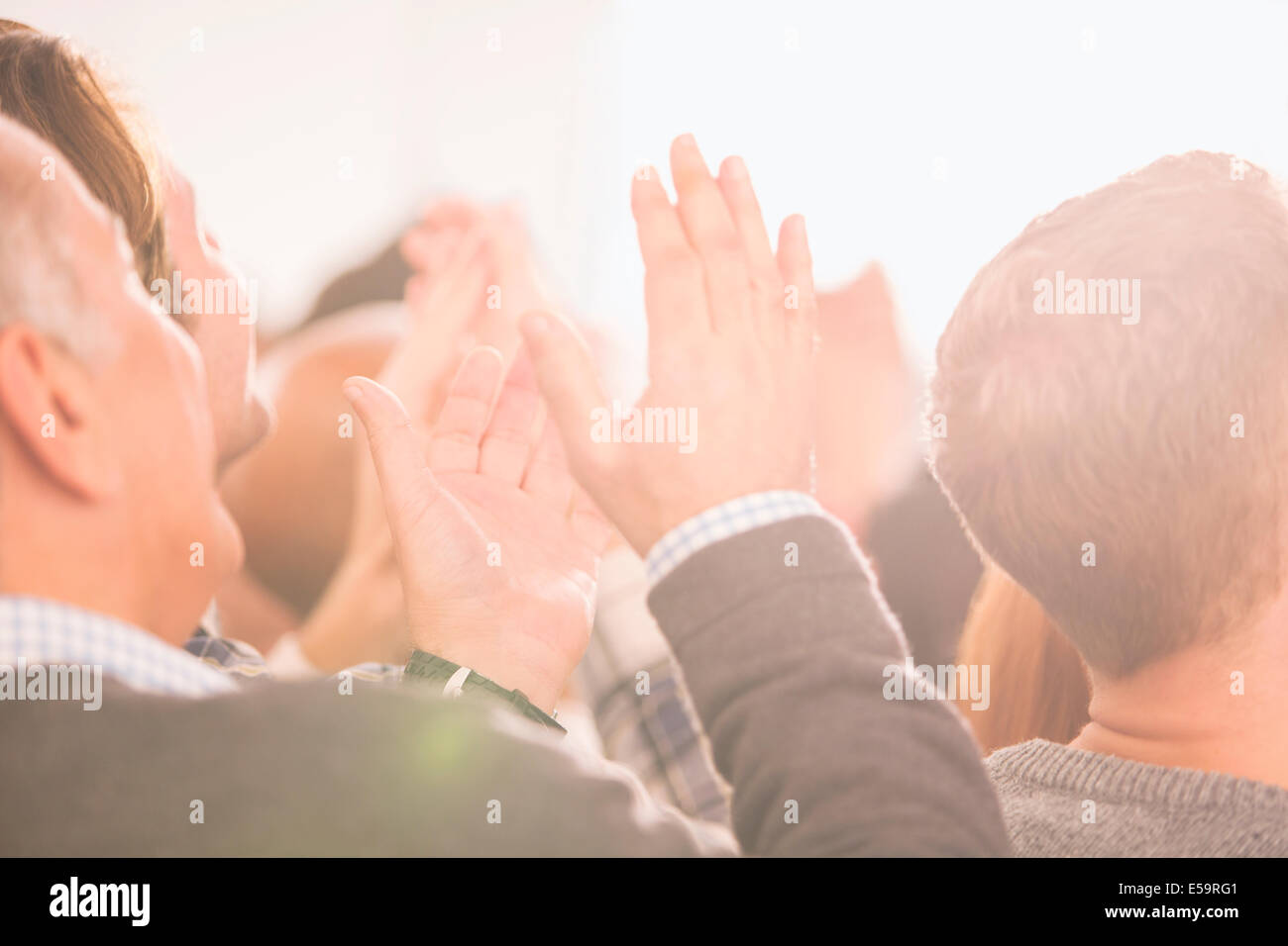 Crowd clapping Stock Photo