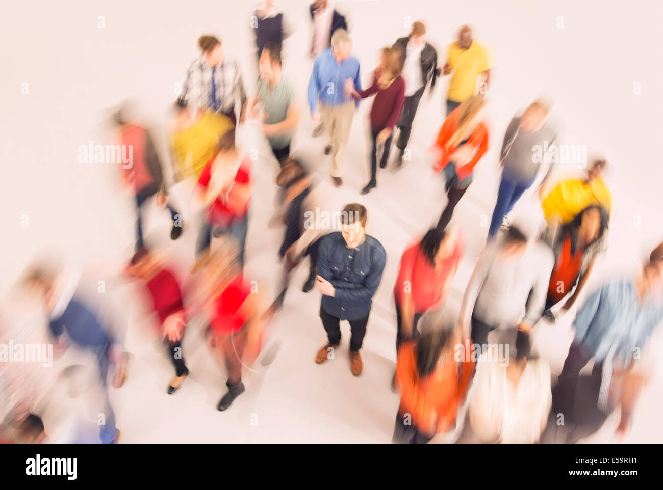 Businessman standing out from the crowd Stock Photo