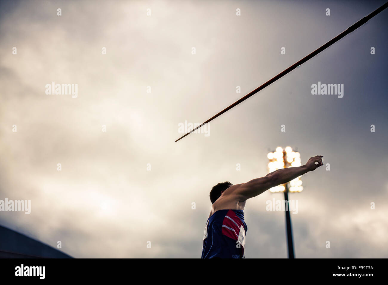 Track and field athlete throwing javelin Stock Photo Alamy