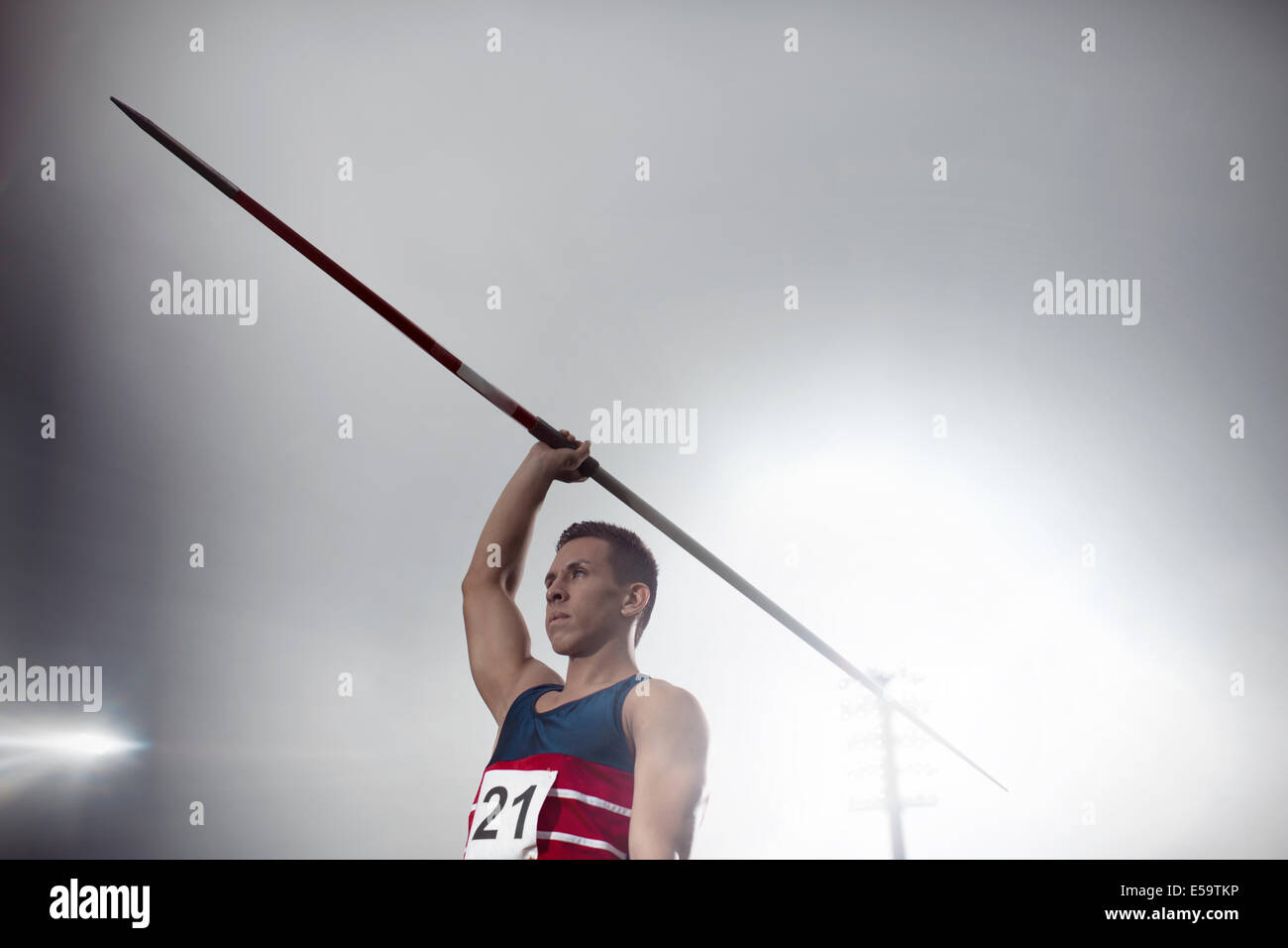 Track and field athlete holding javelin Stock Photo Alamy