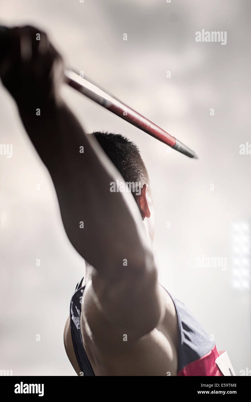 Track and field athlete holding javelin Stock Photo Alamy
