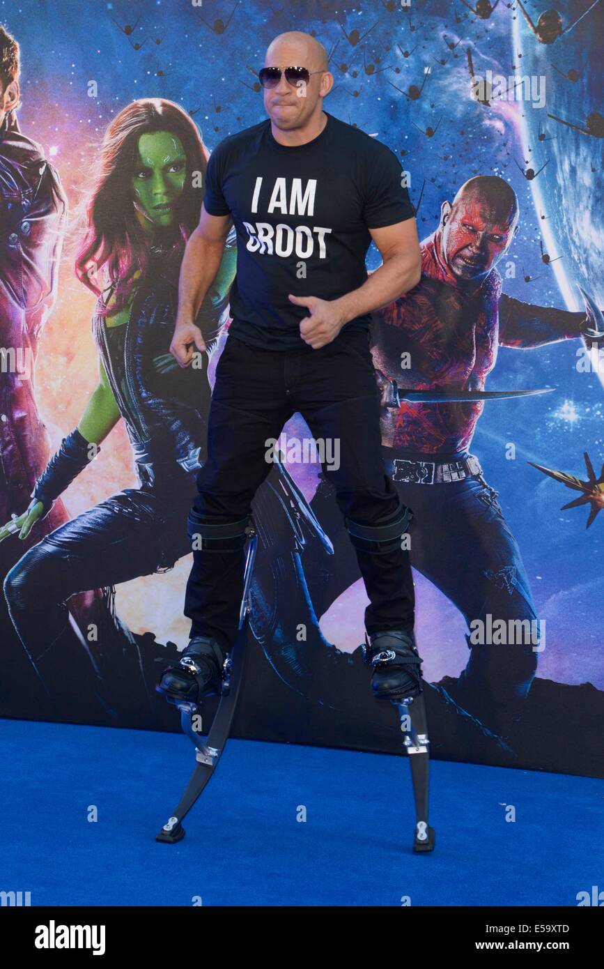 Actor Vin Diesel on stilts attends the European Premiere of Guardians of the Galaxy on 24/07/2014 at Empire Leicester Square, London. Vin used the stilts on set to atain the height of the CGI character Groot that he plays in the film. Persons pictured: Vin Diesel. Picture by Julie Edwards Stock Photo