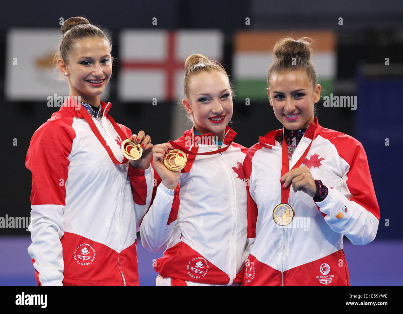 Glasgow. 24th July, 2014. Athletes of Canada pose during the the awarding ceremony for Team Final of Gymnastics Rhythmic at the 2014 Glasgow Commonwealth Games held in Glasgow, Scotland on July 24, 2014. Canada won the gold medal with a total point of 141.450. Credit:  Han Yan/Xinhua/Alamy Live News Stock Photo