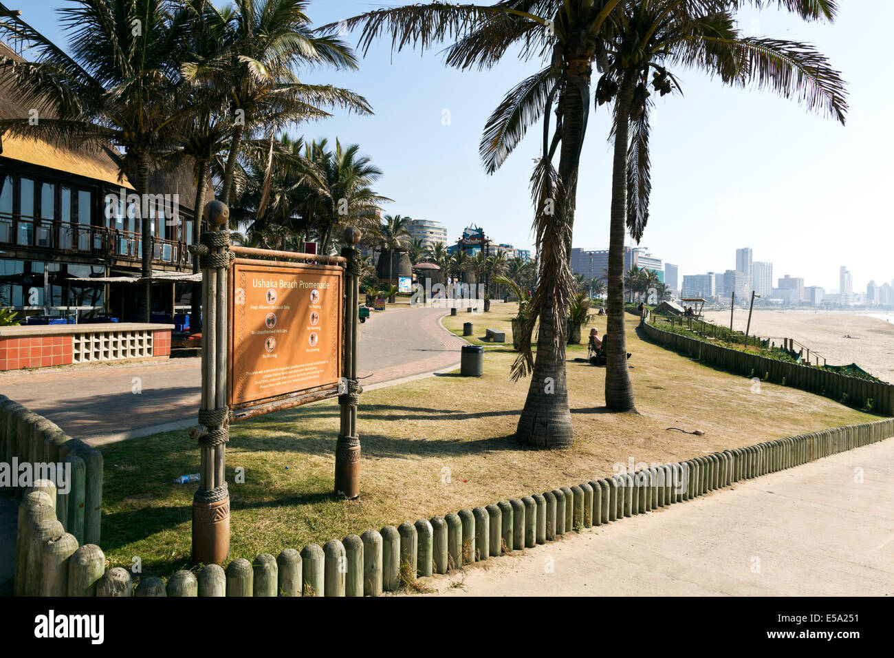 Durban, South Africa. Early morning on Durban's beachfront with Moyo restaurant in the foreground and Ushaka Marine World on the promenade Stock Photo