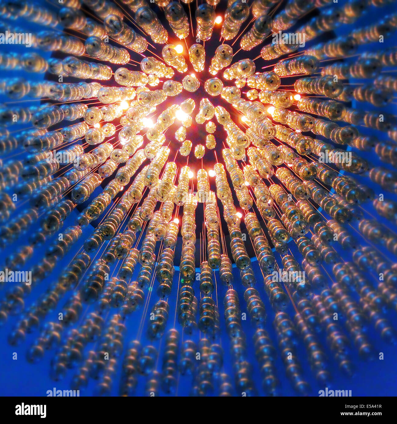 Low angle view of ornate glowing chandelier - Smartphone Captured Stock Image