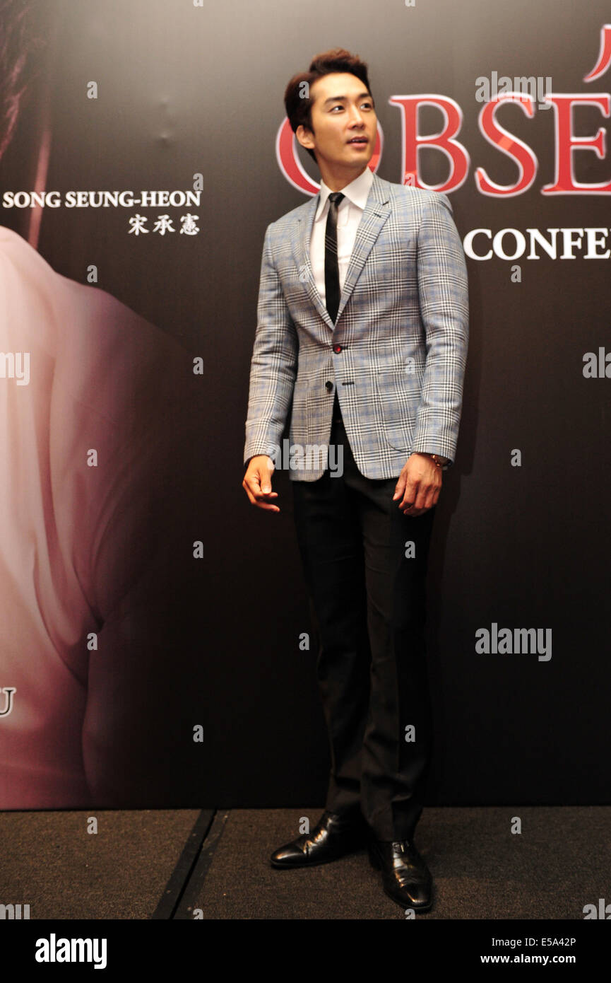 (140725) -- SINGAPORE, July 25, 2014 (Xinhua) -- South Korean actor Song Seung-heon attends the press conference of the film 'Obsessed' in Singapore, July 25, 2014. (Xinhua/Then Chih Wey) Stock Photo