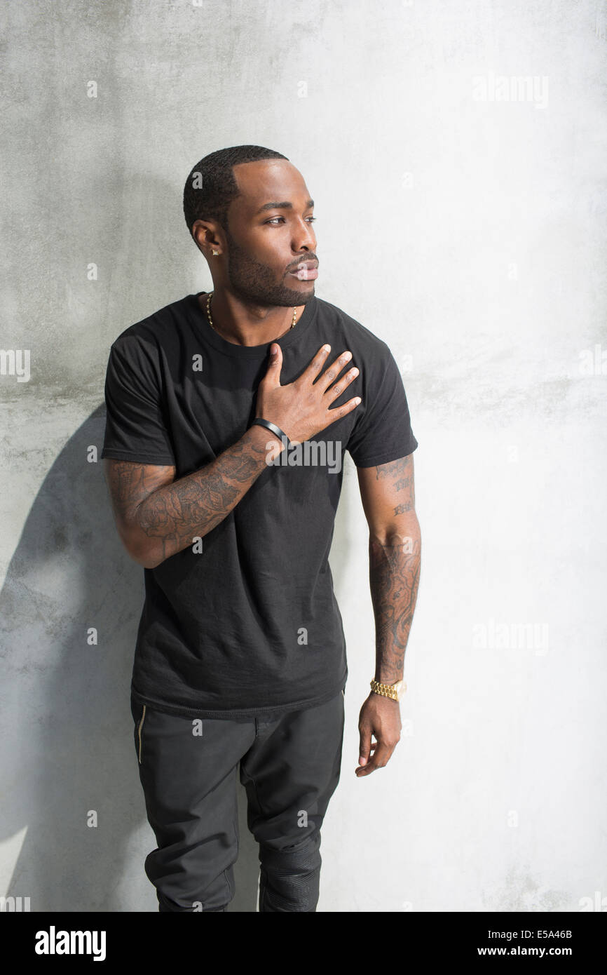 African American man holding his chest Stock Photo