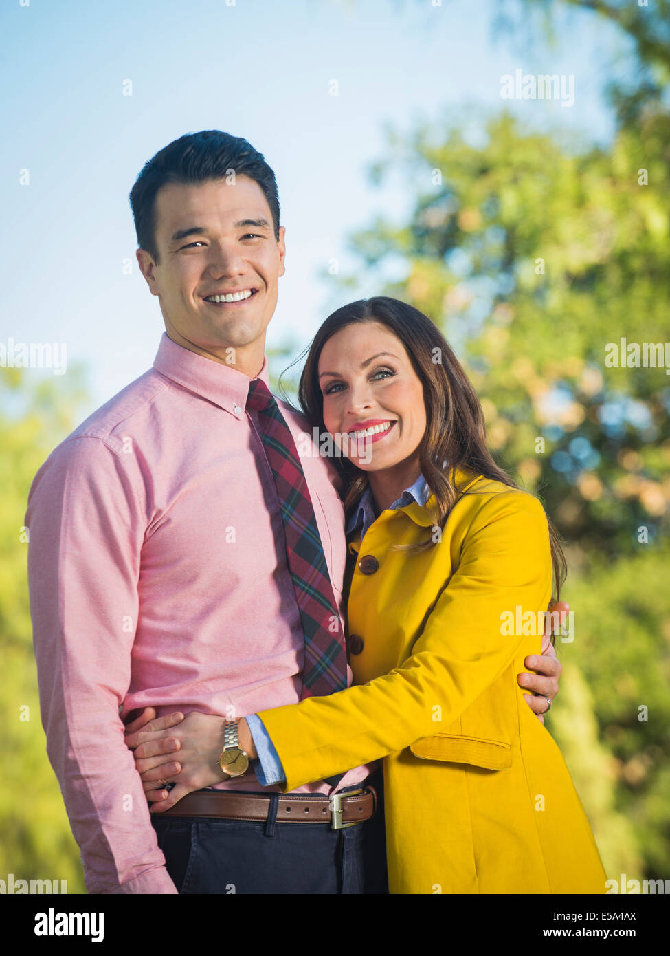 Couple hugging outdoors Stock Photo - Alamy