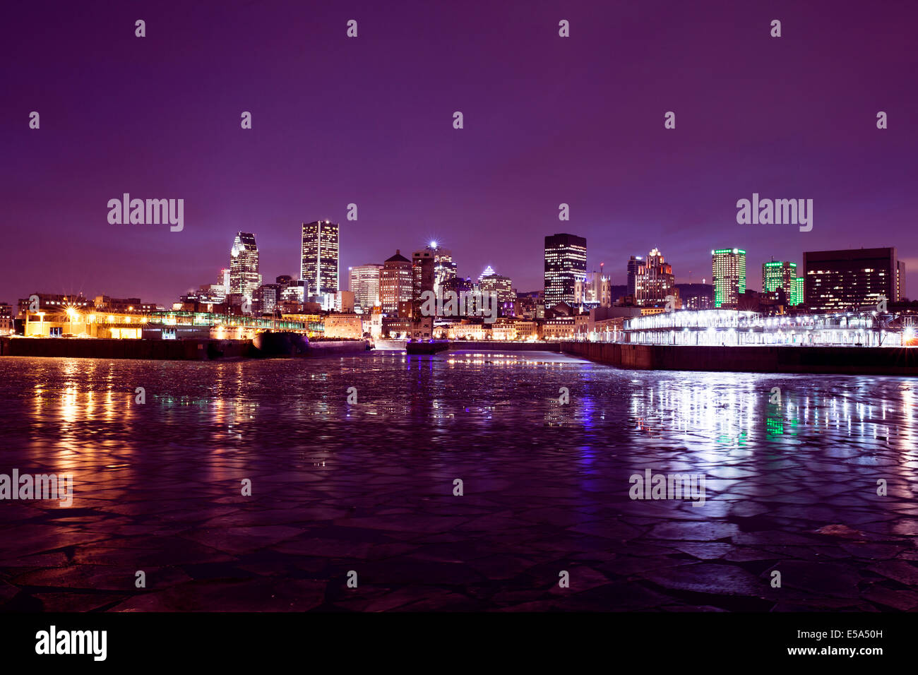 Montreal city skyline lit up at night, Quebec, Canada Stock Photo