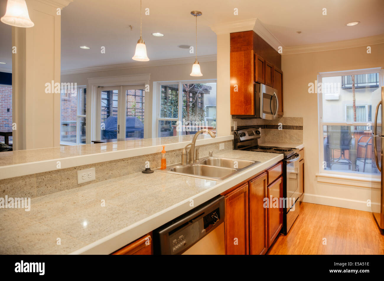 Countertops and sink in modern kitchen Stock Photo - Alamy