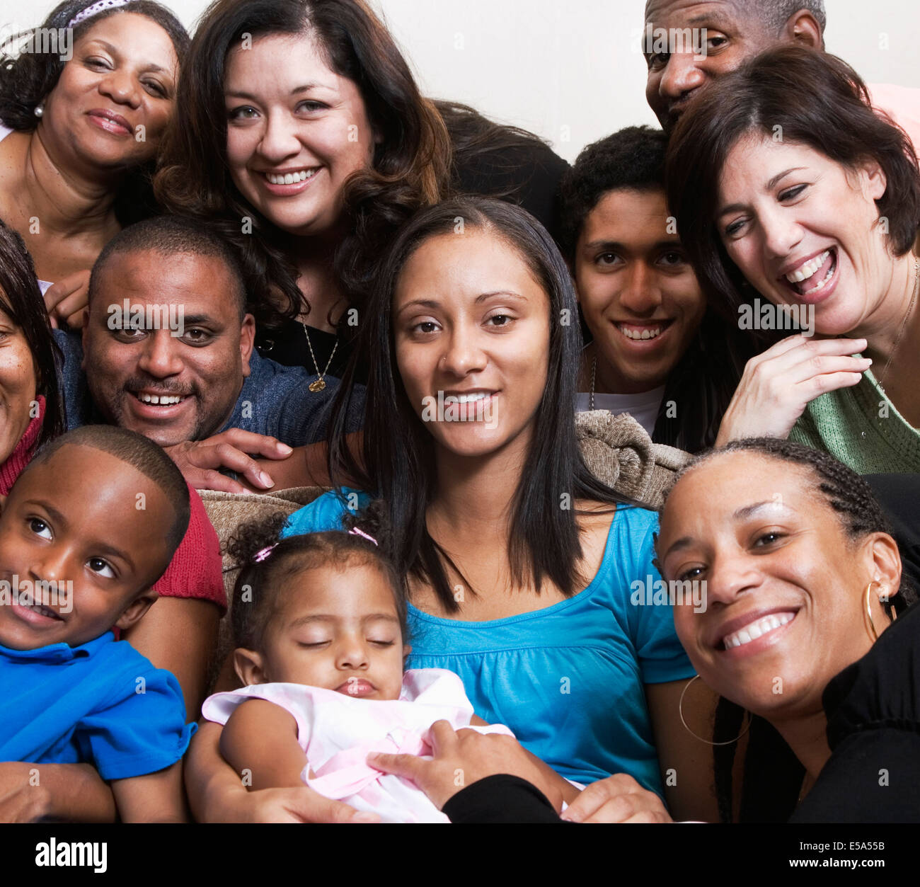 Multi-generation family smiling together Stock Photo