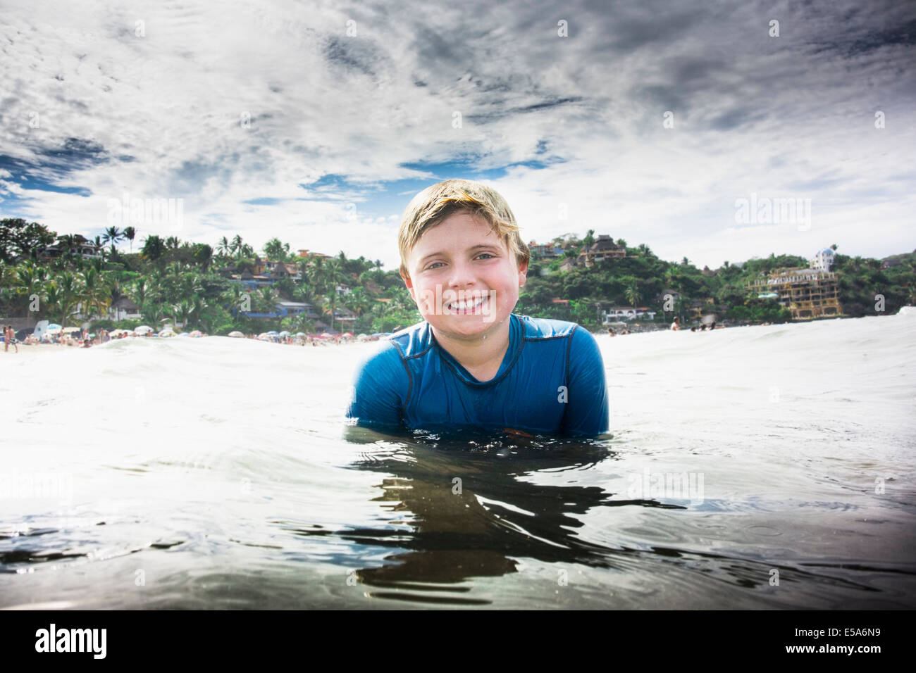 Boy swimming in the ocean hires stock photography and images Alamy