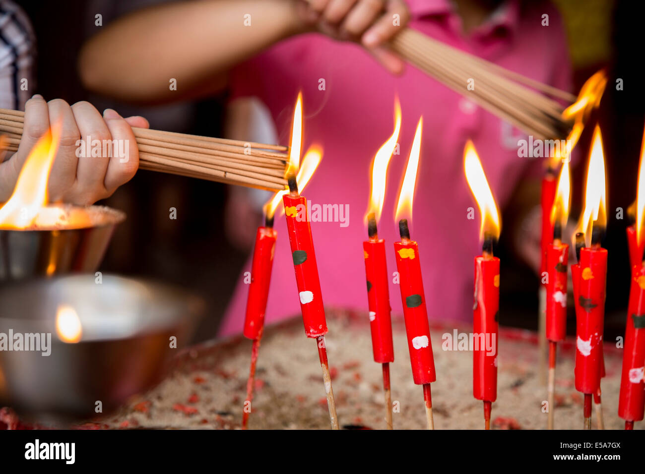 Lighting incense stick hi-res stock photography and images - Alamy
