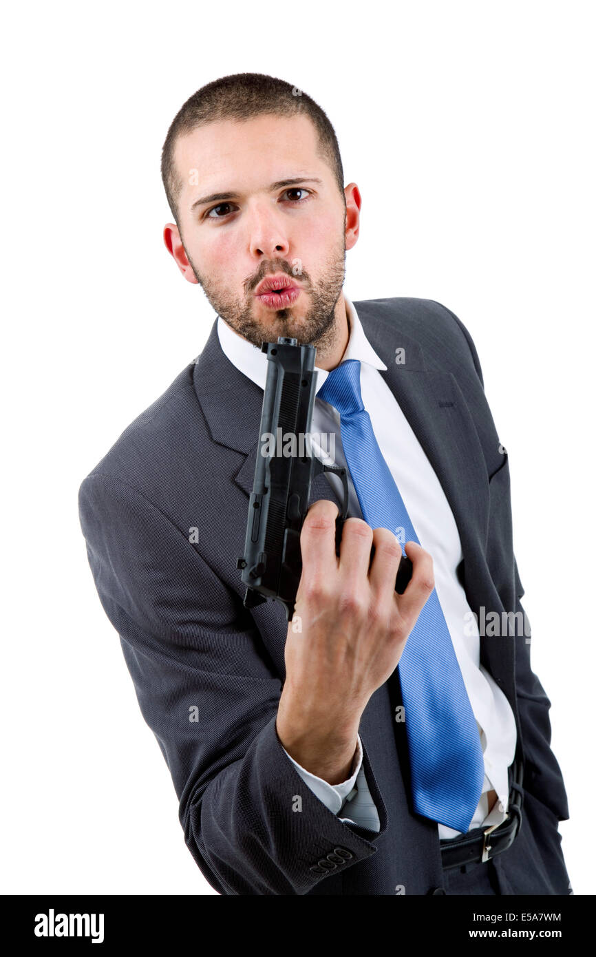 young businessman with a gun, isolated on white Stock Photo