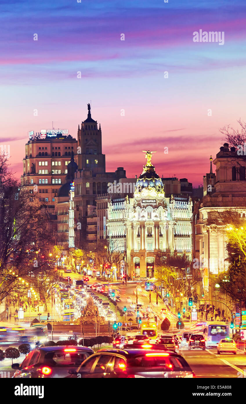 Metropolis building seen from 'Puerta de Alcala' monument by sunset. Madrid, Spain Stock Photo