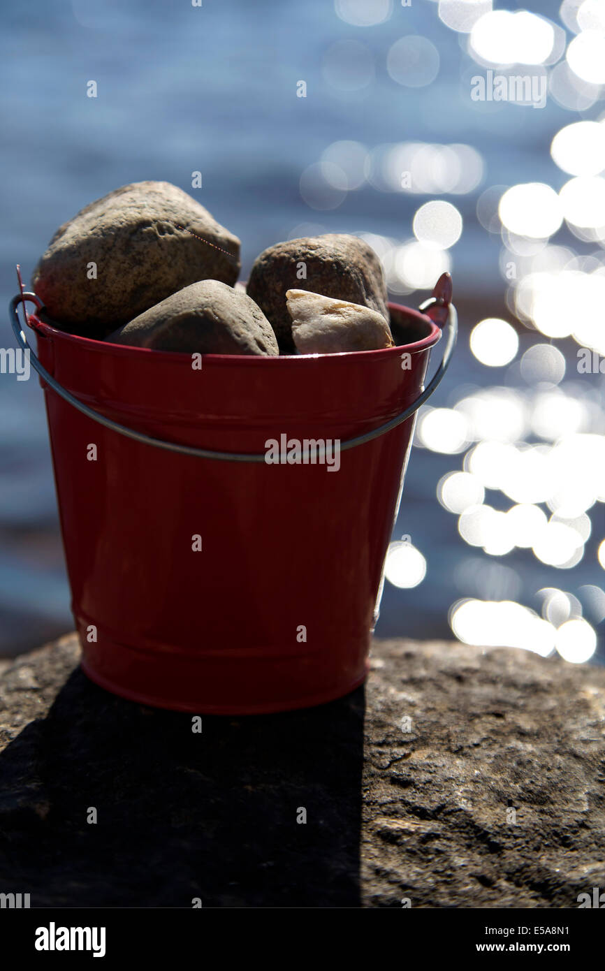 Bucket full of rocks hires stock photography and images Alamy