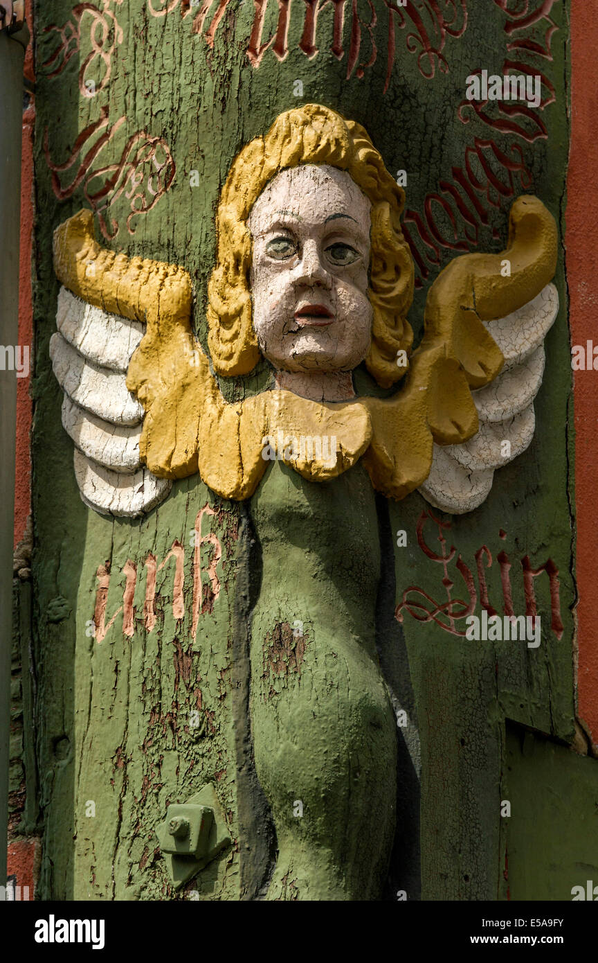 Painted angel figure, carved into a corner post, half-timbered house Neurath-Haus, historic centre, Alsfeld, Hesse, Germany Stock Photo