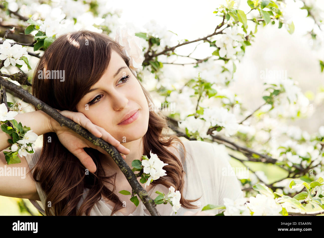 Happy young woman, the orchard. Debica, Poland. Stock Photo