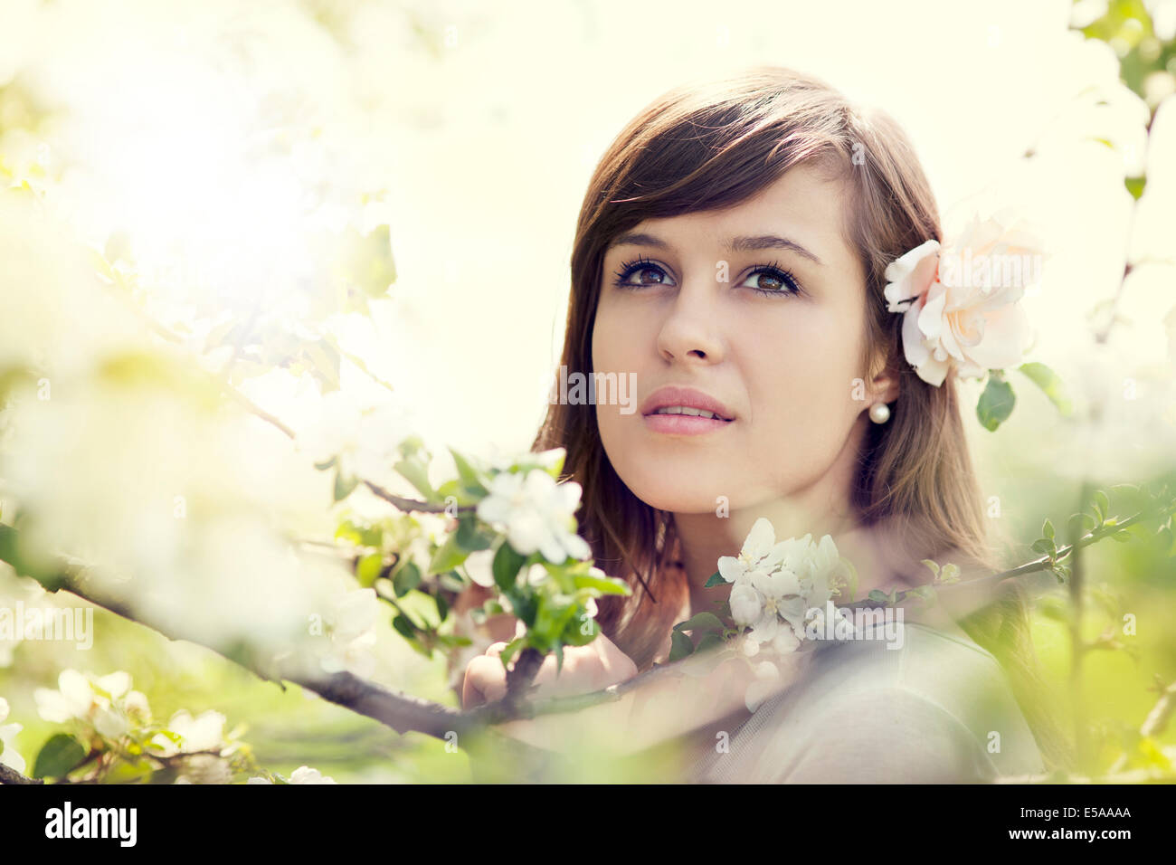 Young woman in the orchard. Debica, Poland. Stock Photo