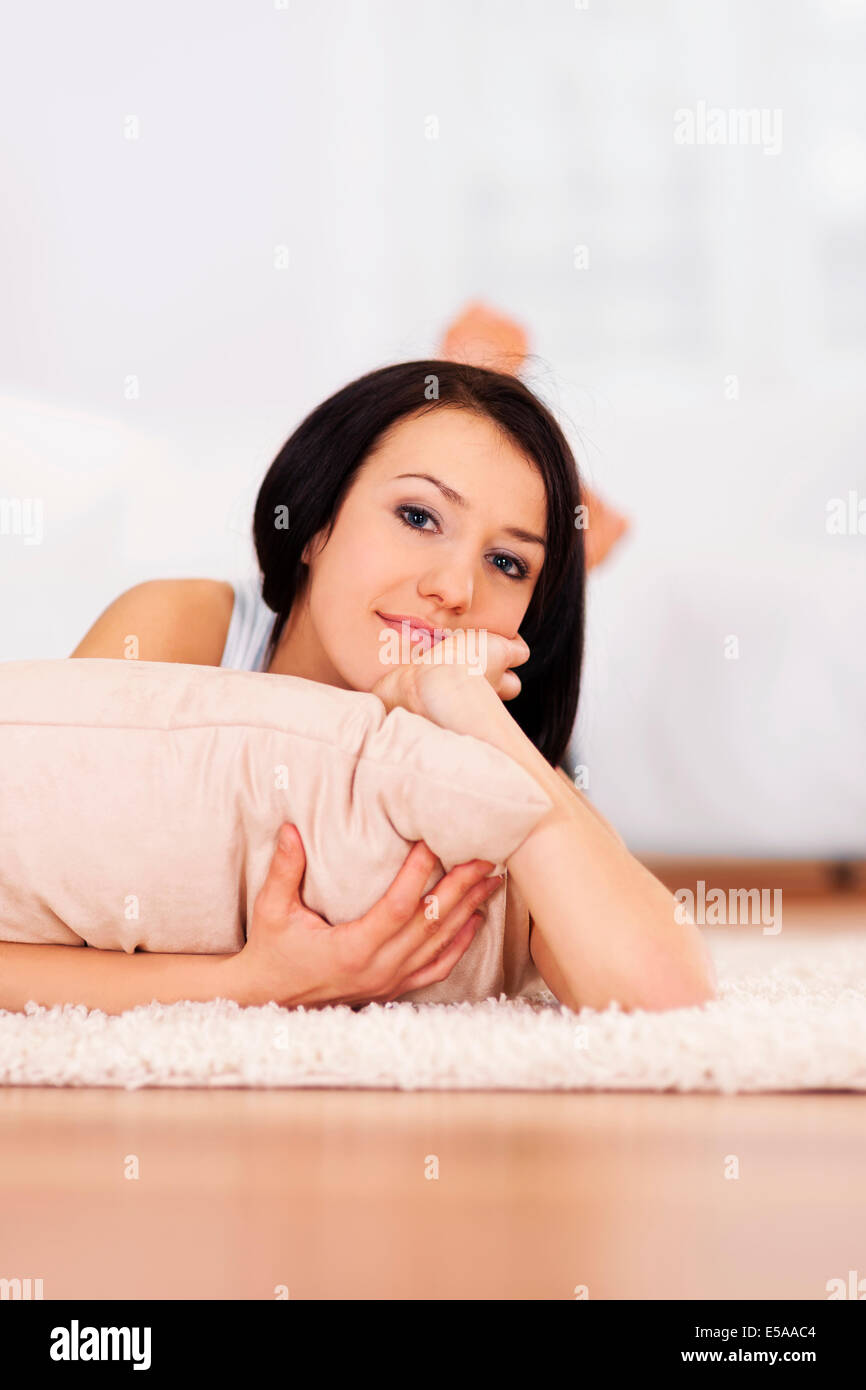 A Young Woman Lying on the Floor in the Studio Showing Her Big Long Legs  and Bottom, on a White Background. Copy Space Stock Photo - Image of legs,  fitness: 181216346