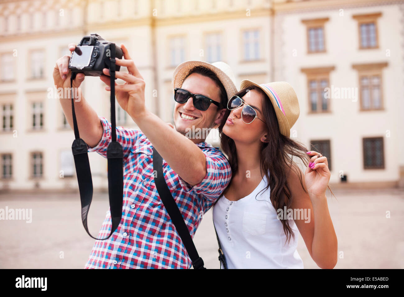 Happy tourists taking photo of themselves, Debica, Poland Stock Photo