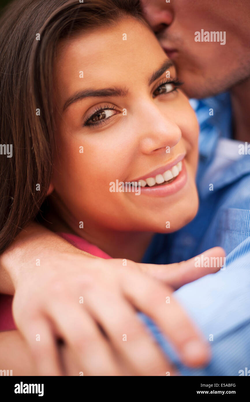Beautiful woman kissing man hi-res stock photography and images - Alamy