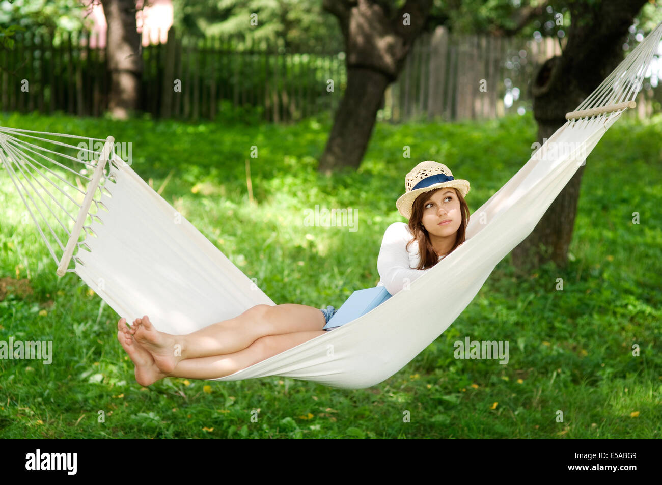 Young woman lying down on hammock, Debica, Poland Stock Photo Alamy