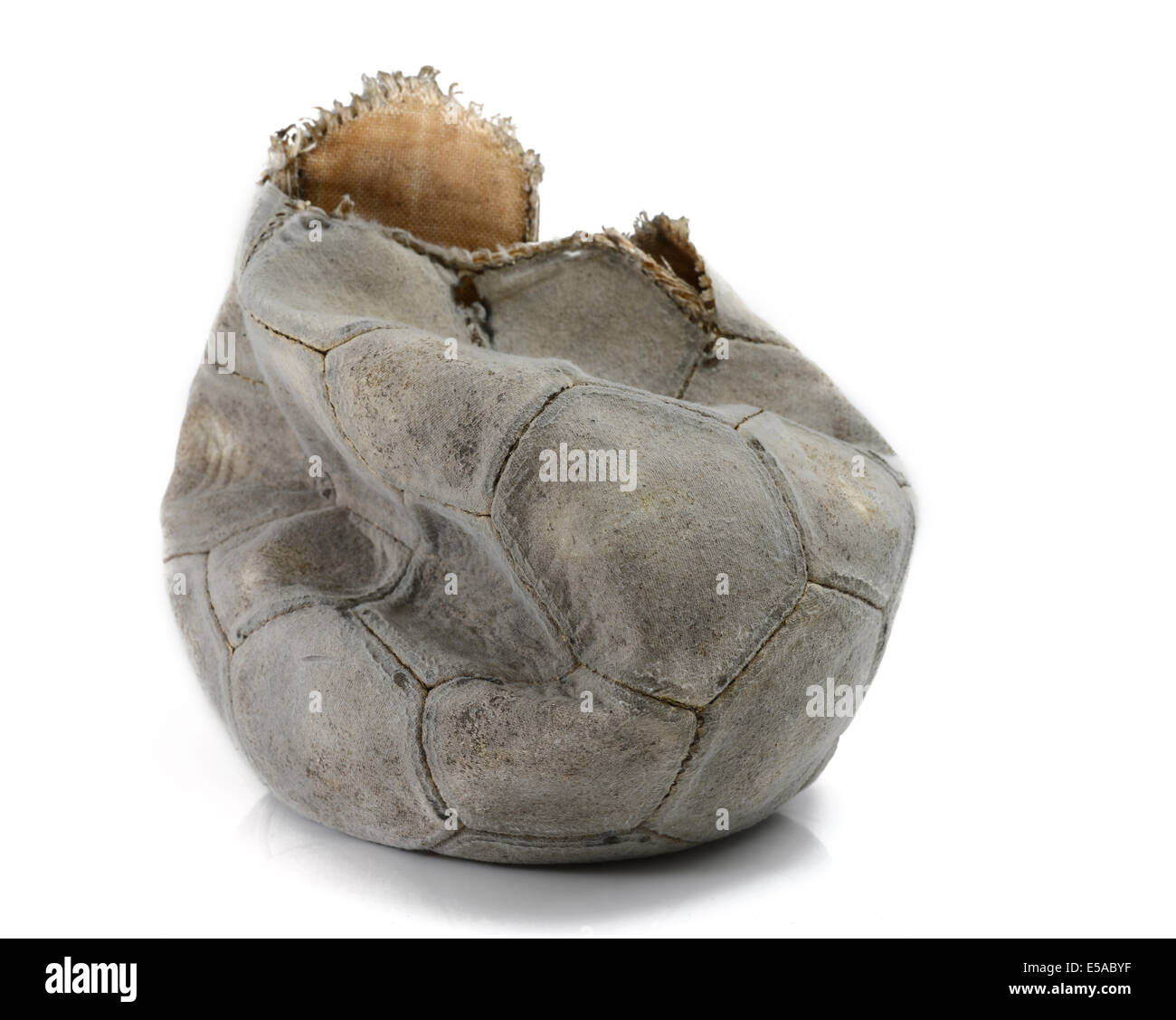 Broken football isolated Stock Photo - Alamy