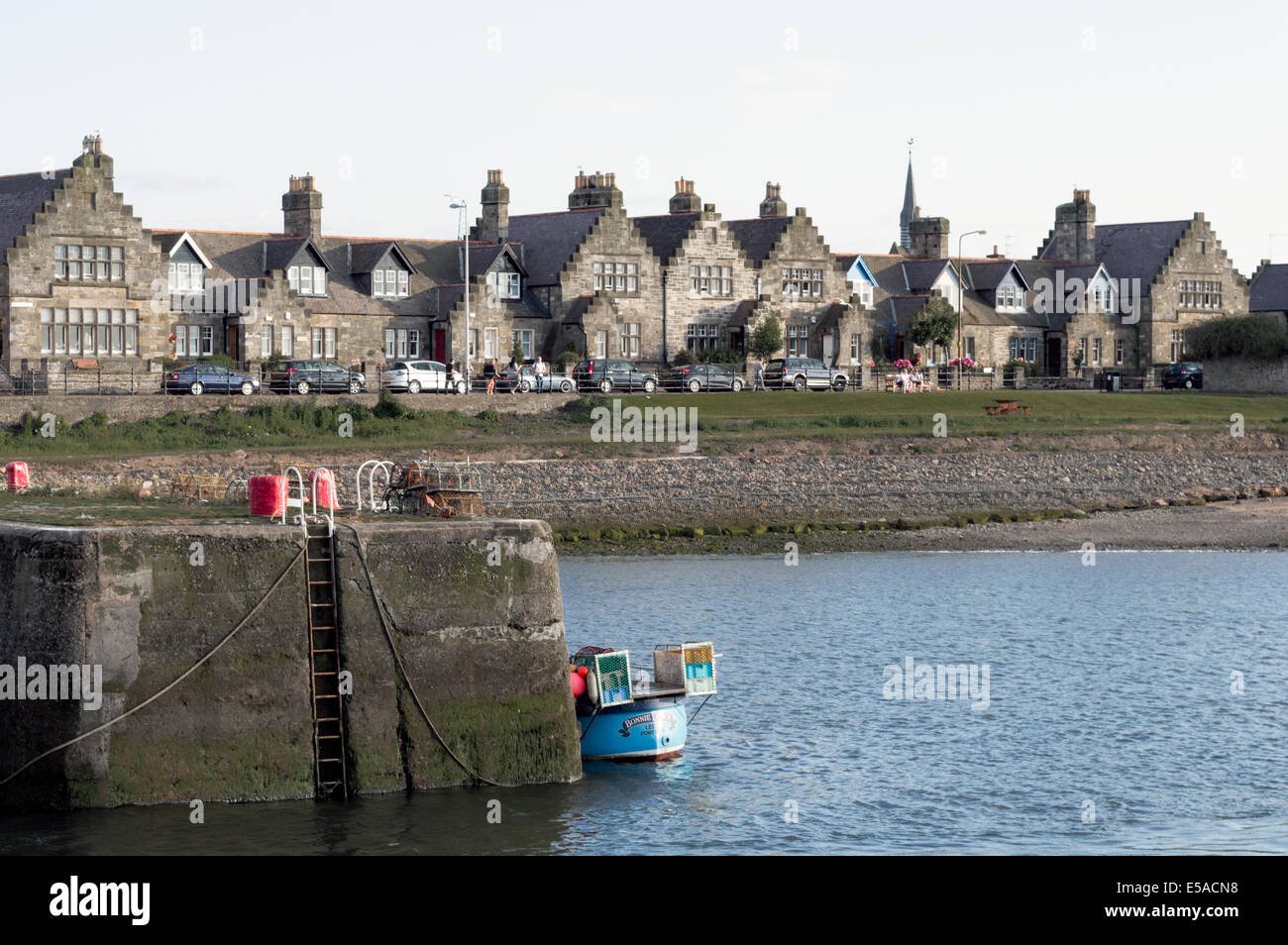 Traditional terraced houses facing the harbour at Port Seton, East