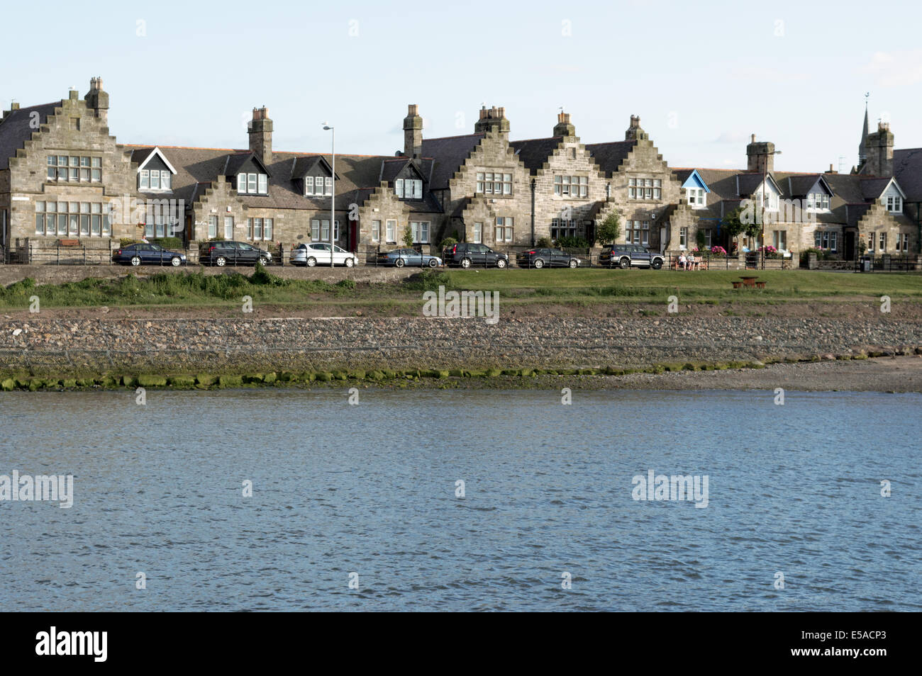 Traditional terraced houses facing the harbour at Port Seton, East