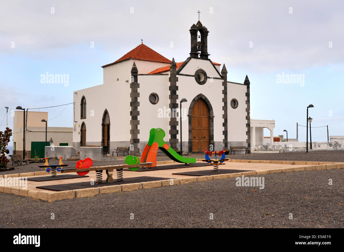 Small church and children’s playground at Poris de Abona, Tenerife Stock Photo