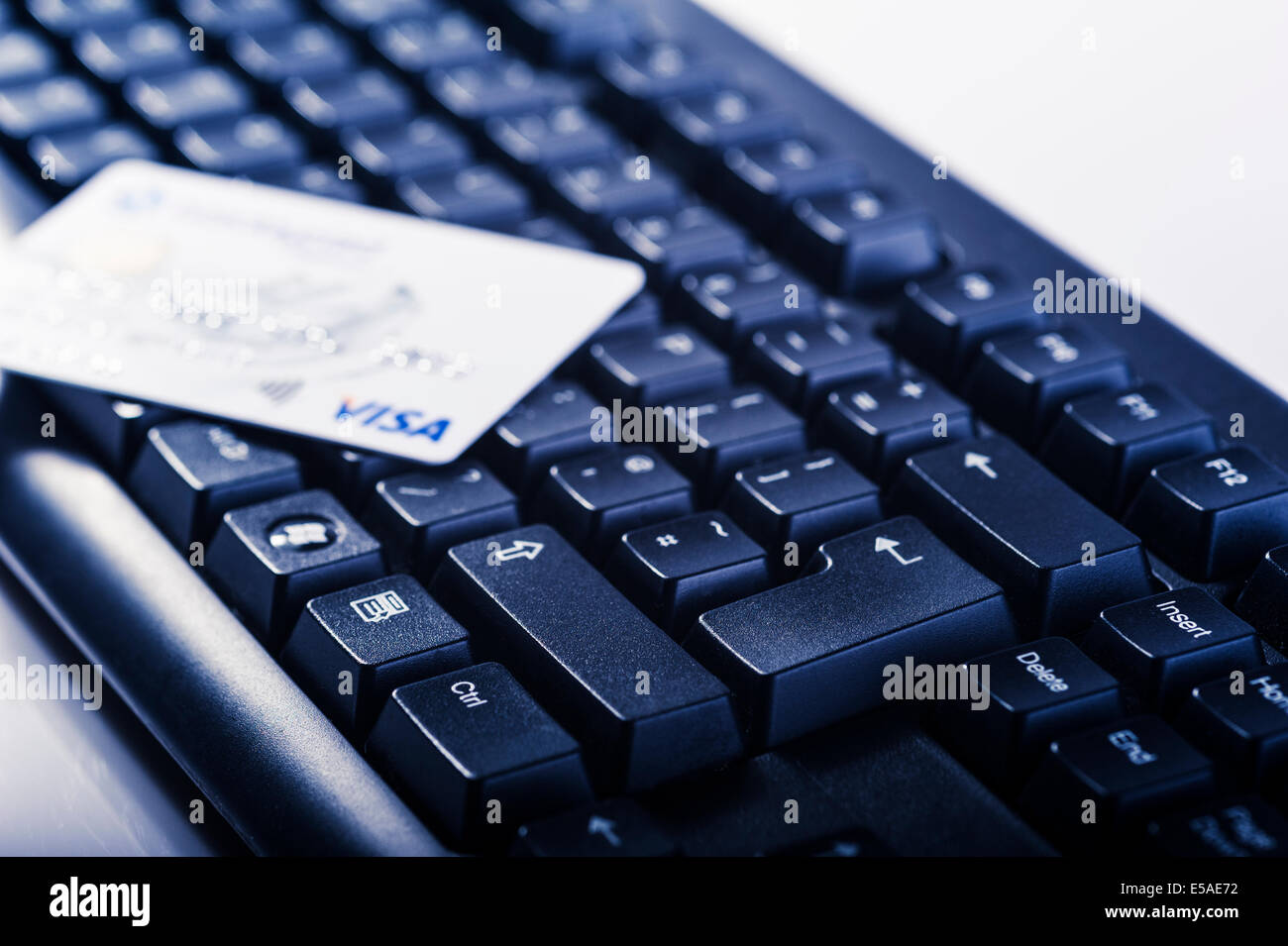 Credit card on a computer keyboard Stock Photo Alamy