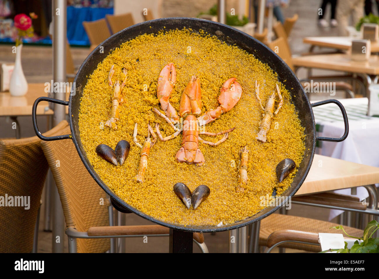 A paella dish outside a restaurant Valencia Spain Stock Photo Alamy