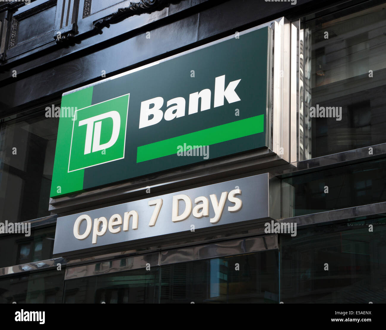 TD Bank sign advertising their 'Open 7 Days' a week policy. Stock Photo