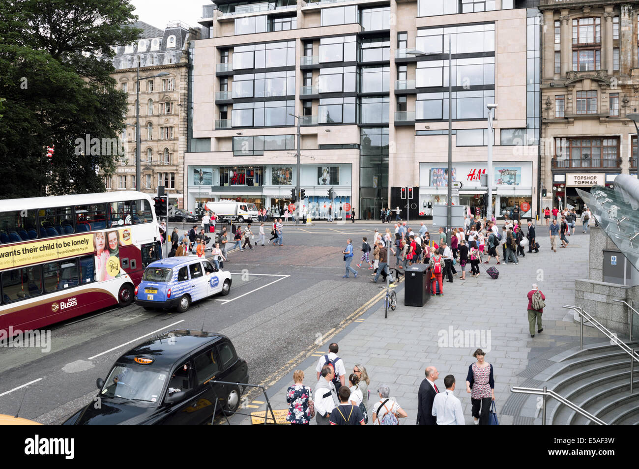Street scene of the corner of Waverley Bridge and Princes Street Stock Photo