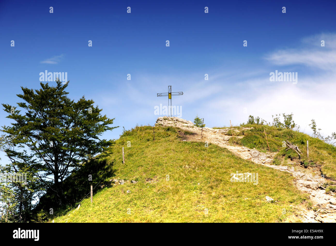 Crucifix on a mountain peek Stock Photo