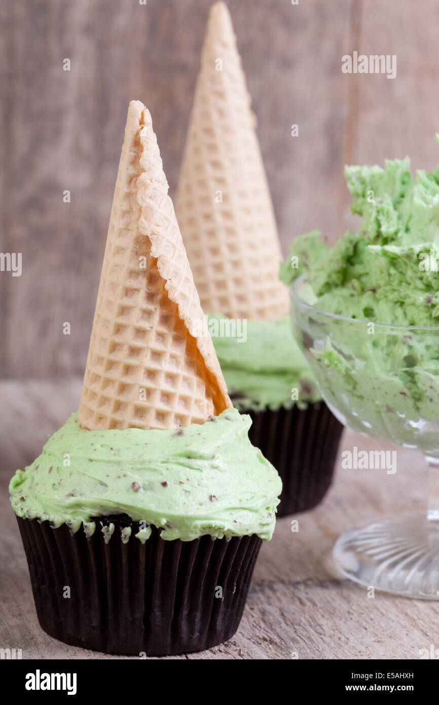 mint choc chip cupcakes with ice cream cones. Stock Photo