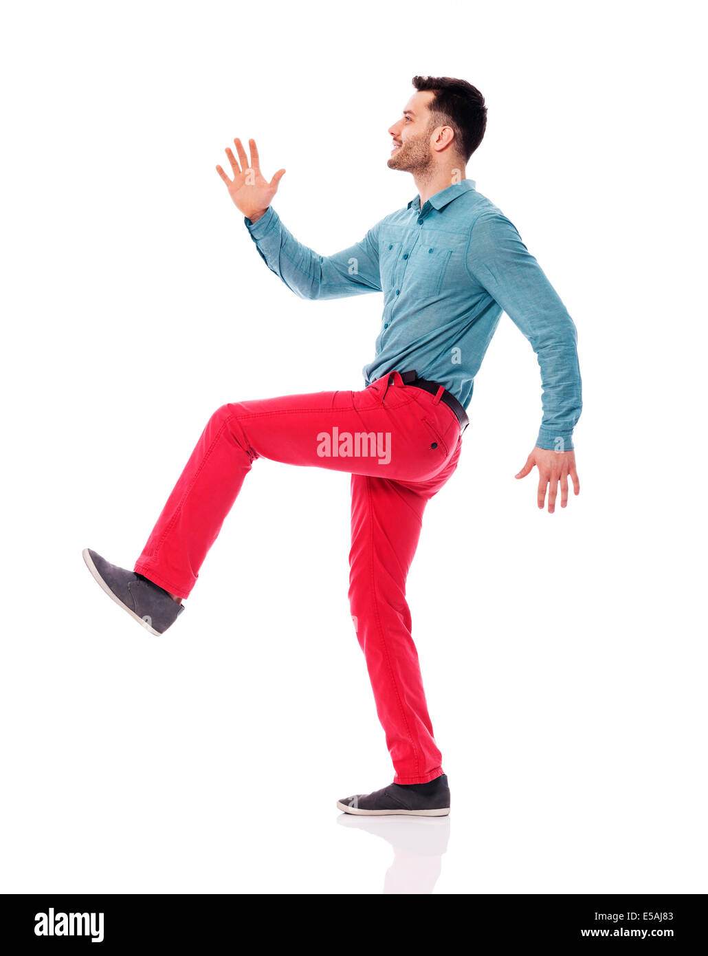 Young man stepping up for success Cut Out Stock Images & Pictures Alamy