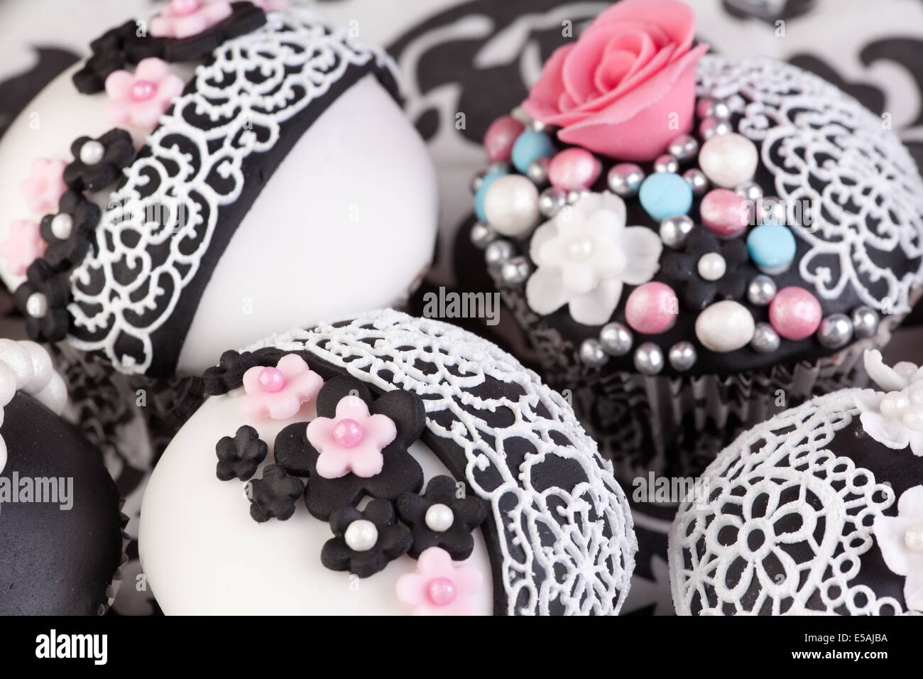 decorated cupcakes with edible lace Stock Photo Alamy