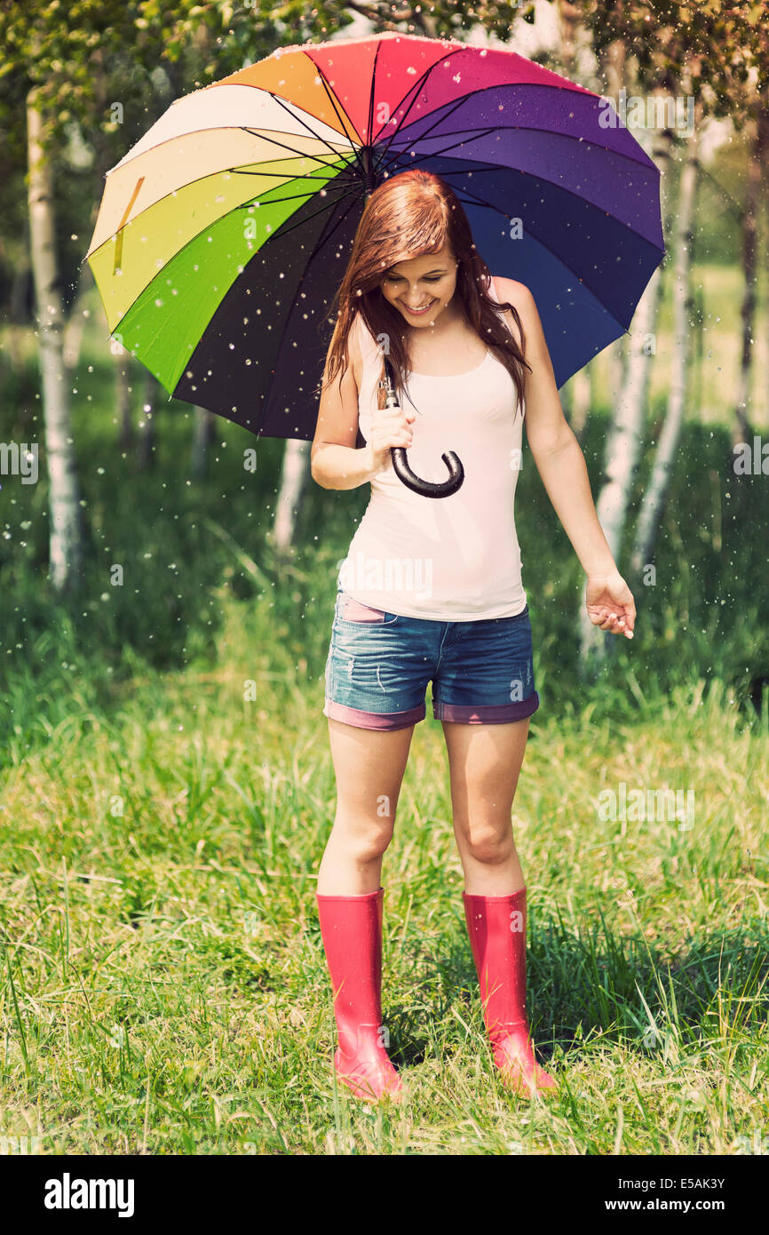Smiling woman in rainy summer day, Debica, Poland. Stock Photo