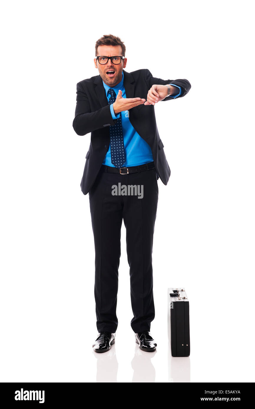 Angry businessman waiting for late business partner Debica, Poland ...