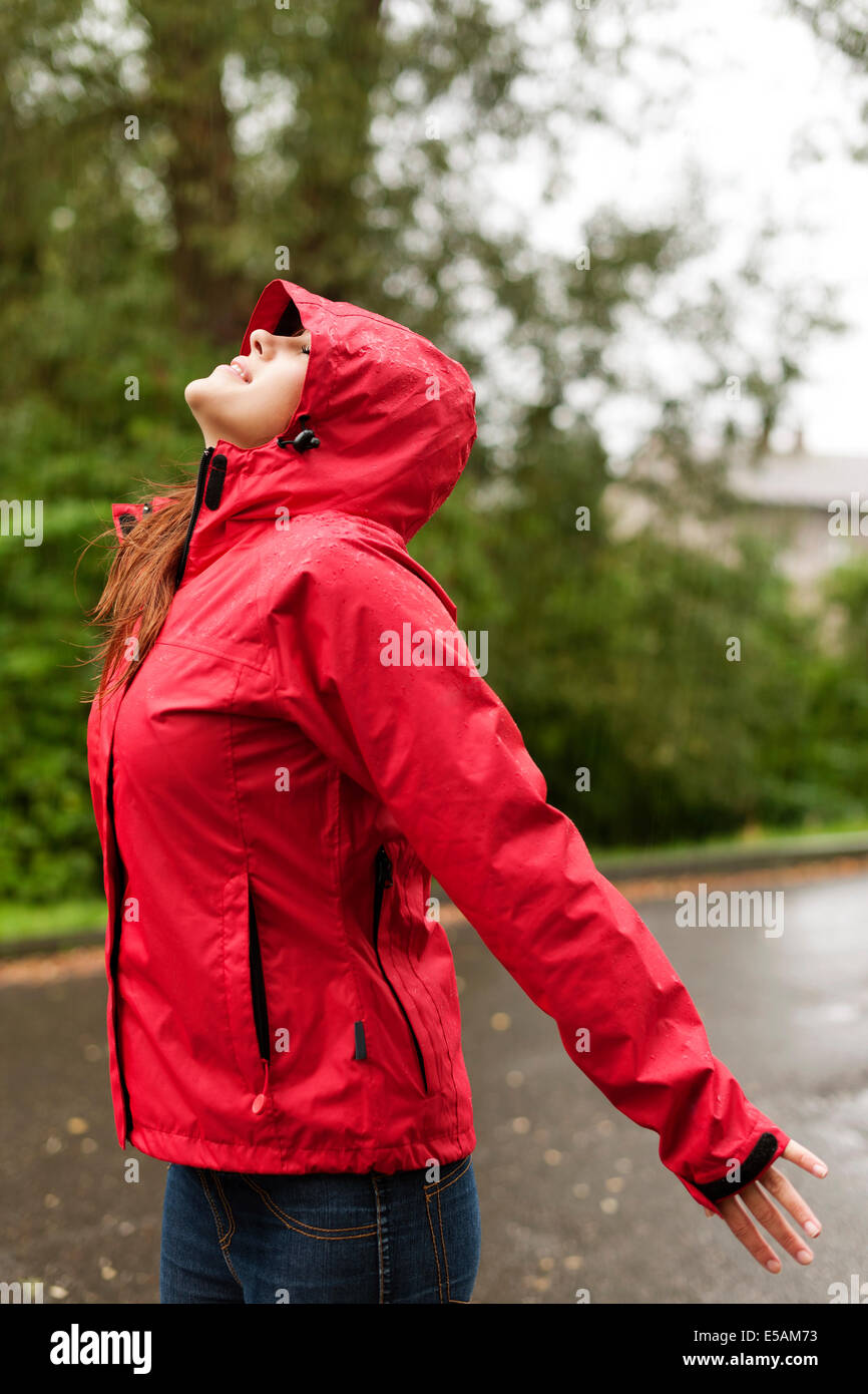 Woman in the rain Debica, Poland Stock Photo
