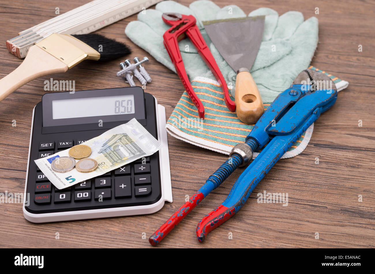 Image shows some tools from a craftsman and the salary Stock Photo Alamy