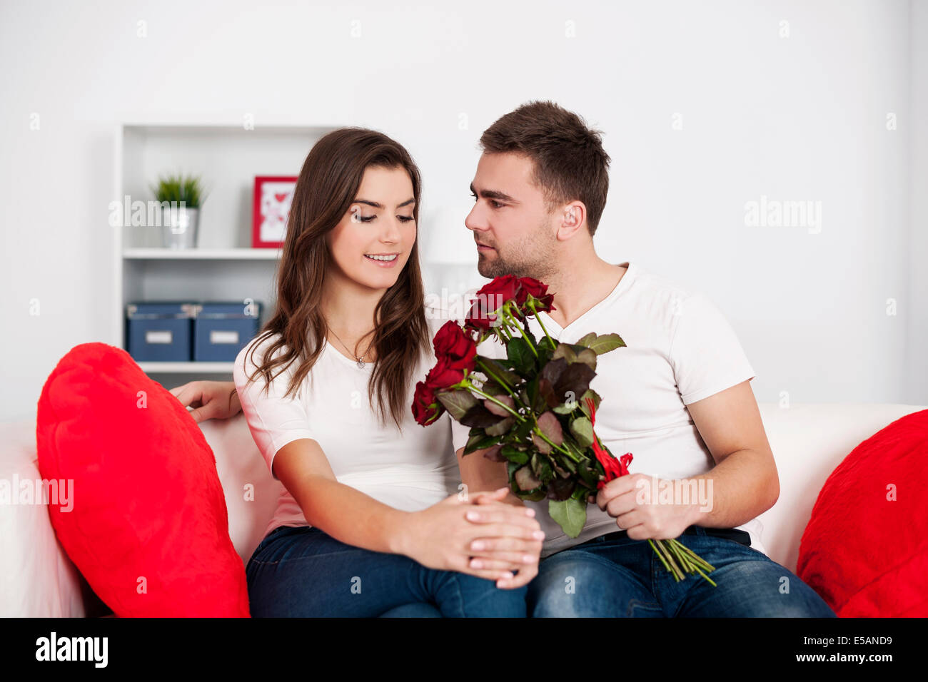 Loving couple with red roses Debica, Poland Stock Photo