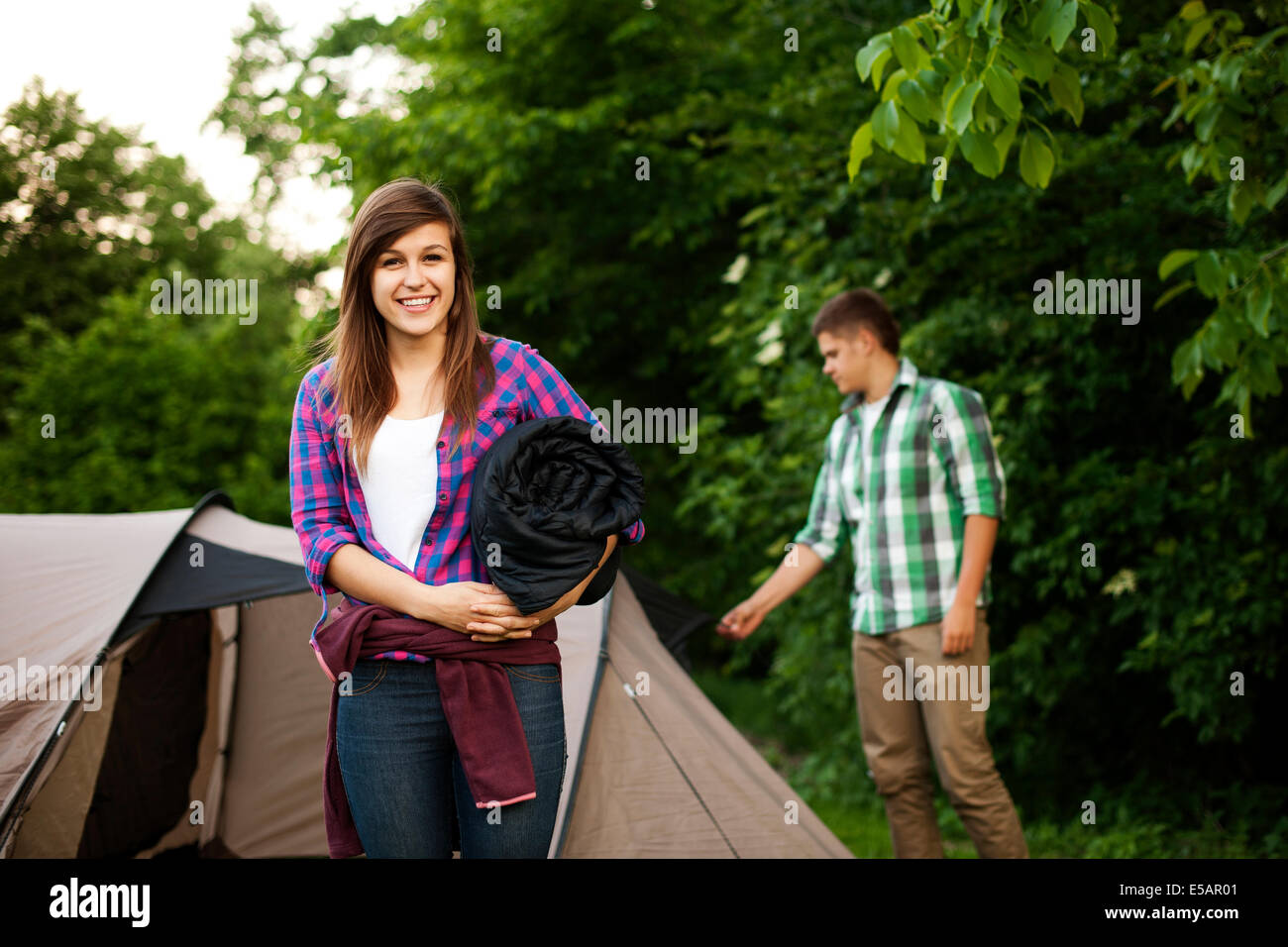 Young woman with sleeping bag Debica, Poland Stock Photo Alamy