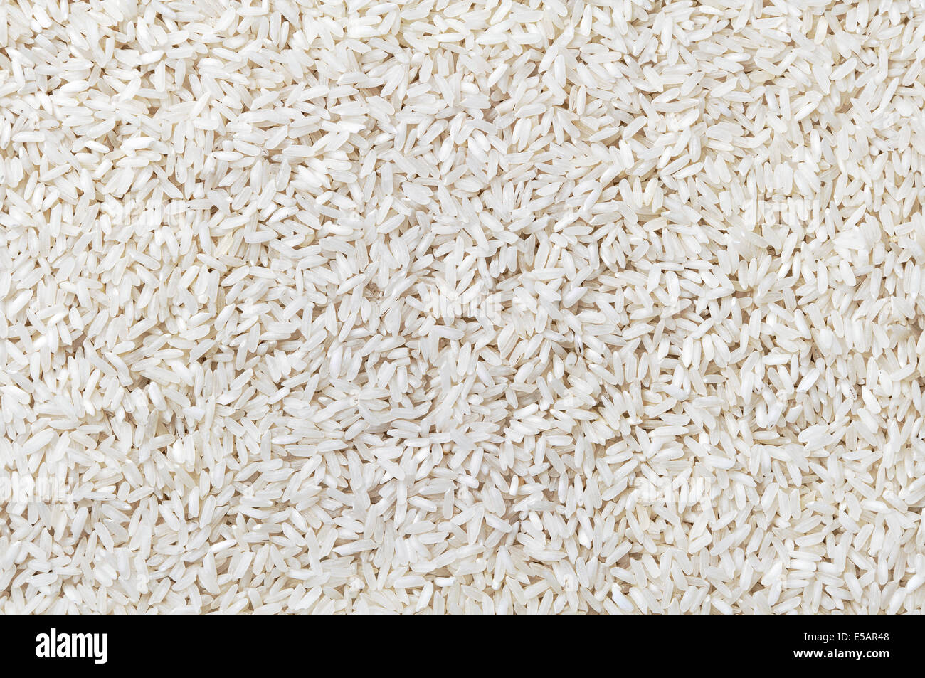 Texture of the white rice grains Stock Photo Alamy