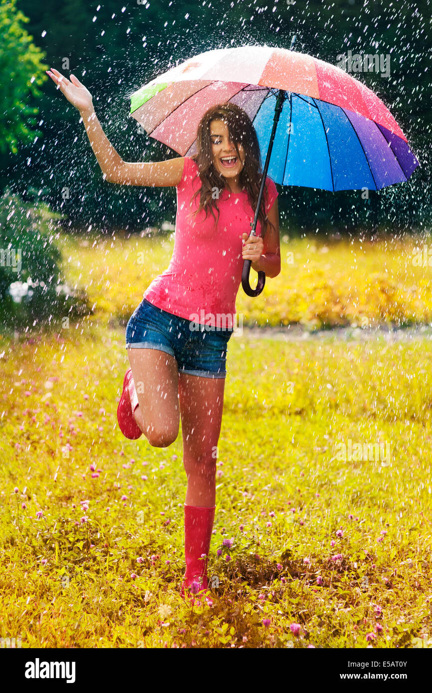 Young and beautiful woman have fun in rain  Debica, Poland Stock Photo