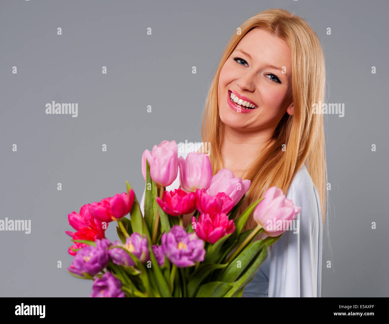 Young woman with spring flower Debica, Poland Stock Photo