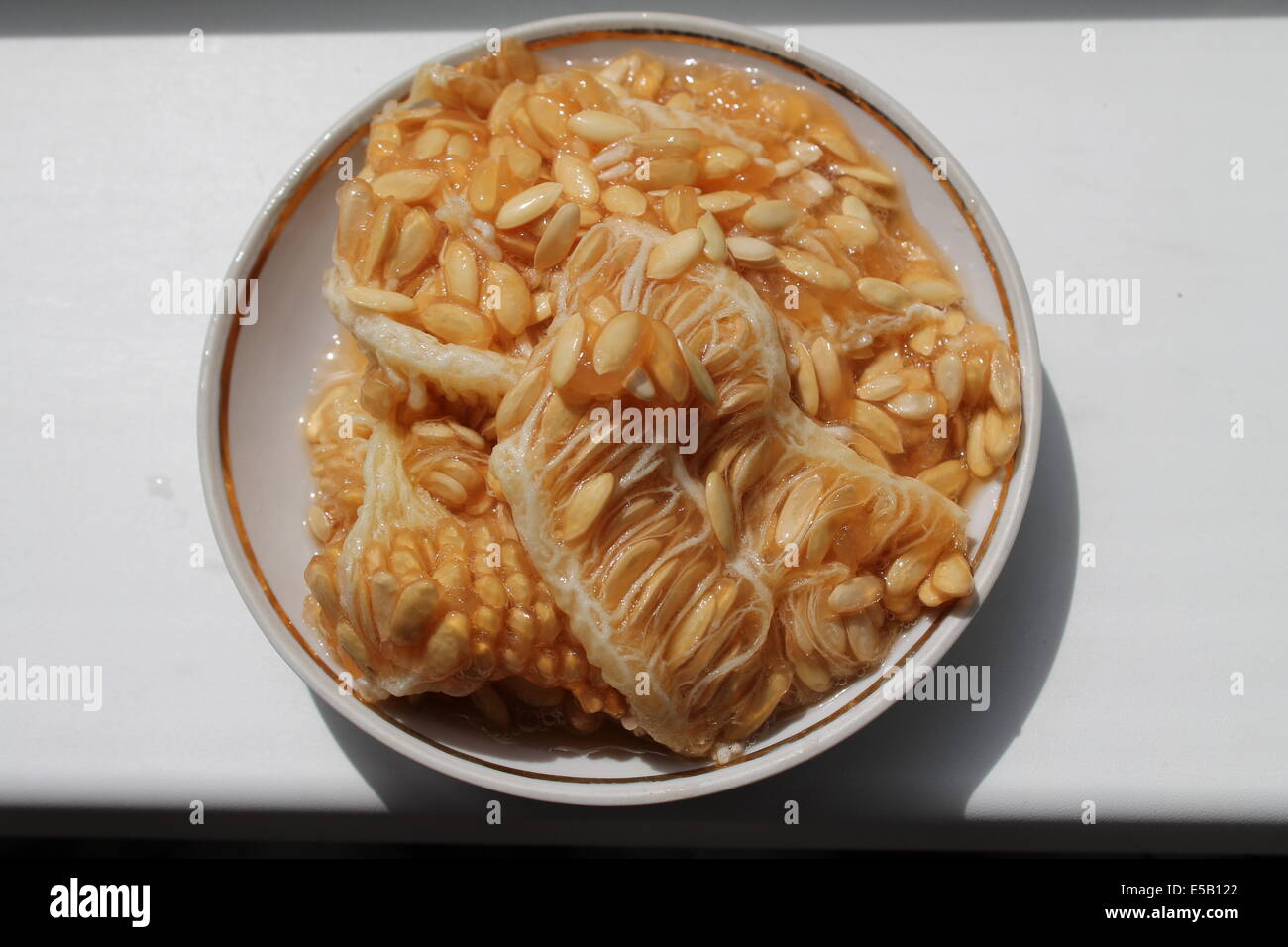 sweet yellow in pulp and juice seeds of melon Stock Photo